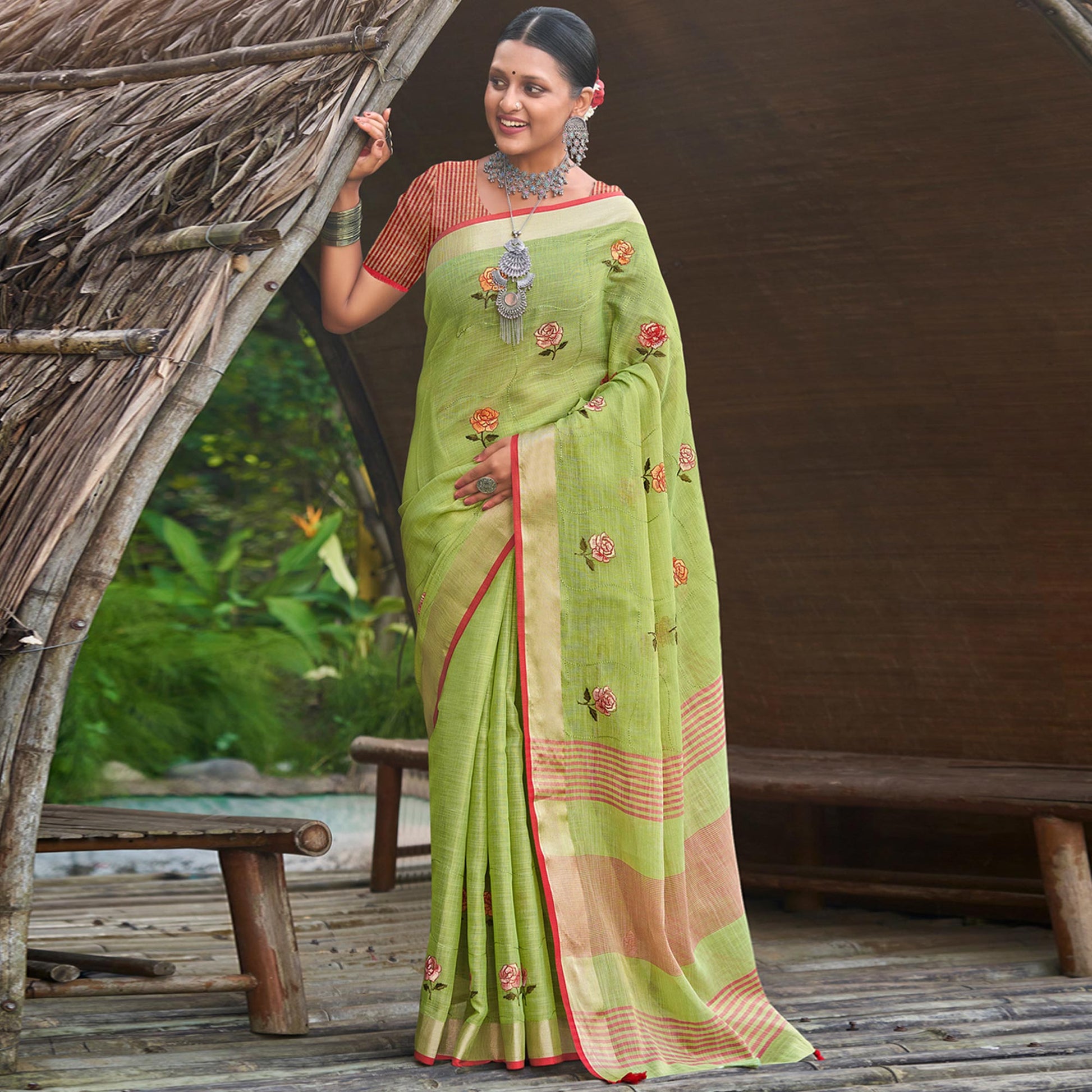 green-floral-embroidered-linen-saree-with-tassels-2