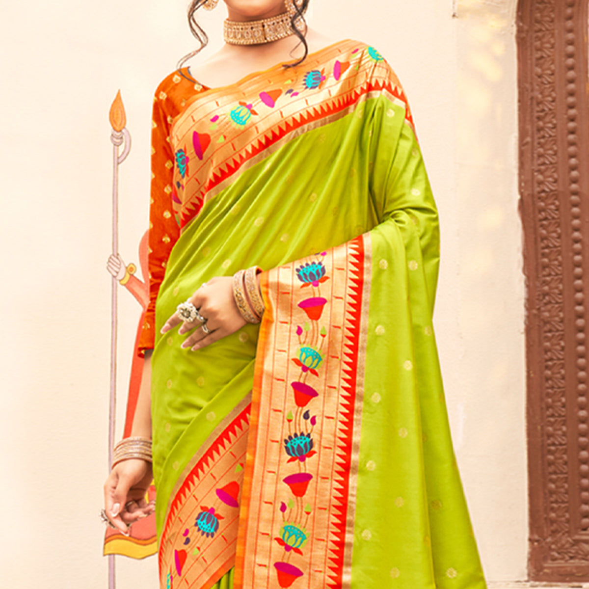 green-floral-woven-banarasi-silk-saree-with-tassels