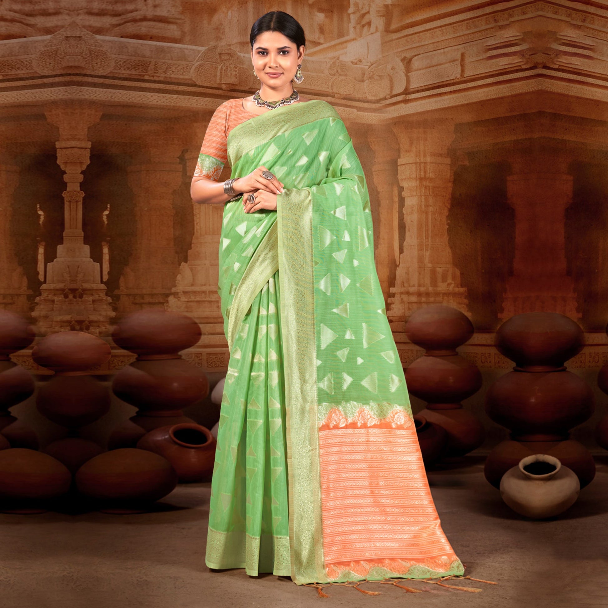 green-woven-linen-saree-with-tassels-1