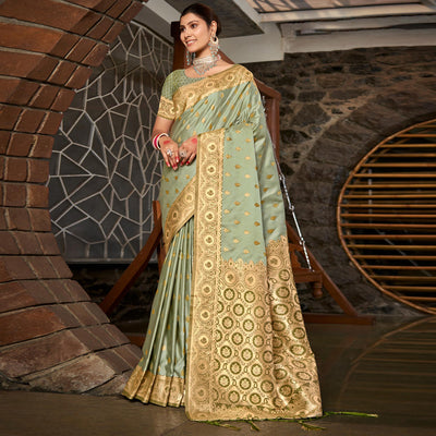 Light Green Woven Satin Silk Saree With Tassels