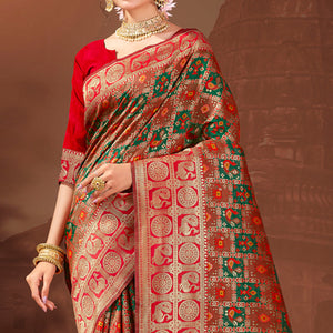 green-rust-woven-patola-banarasi-silk-saree-with-tassels