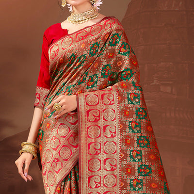 green-rust-woven-patola-banarasi-silk-saree-with-tassels