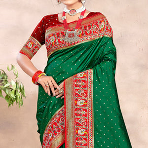 green-woven-patola-banarasi-silk-saree-with-tassels