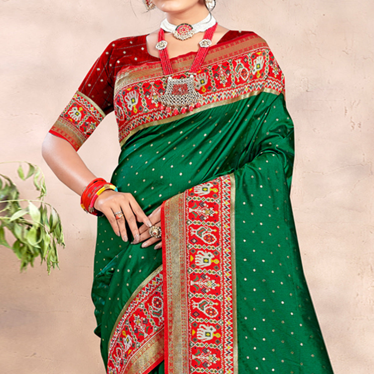 green-woven-patola-banarasi-silk-saree-with-tassels