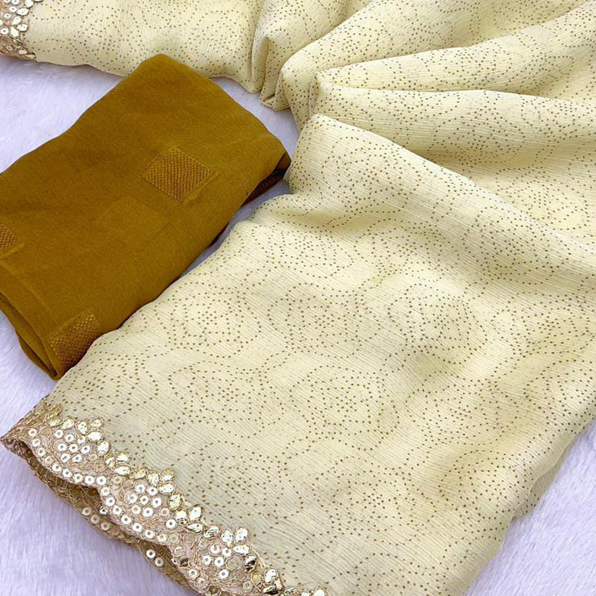 Cream Printed Chiffon Saree With Sequins Embroidered Border