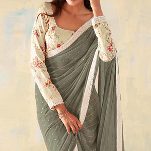 grey-foil-printed-georgette-saree-with-embroidered-border