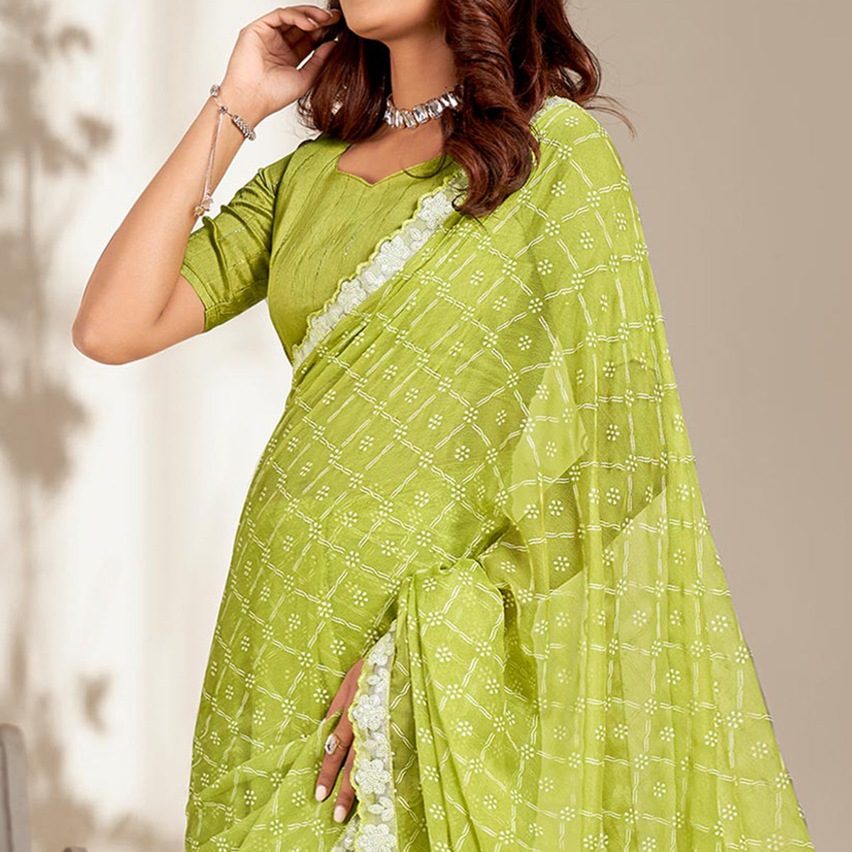 green-floral-printed-chiffon-saree-with-embroidered-border