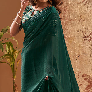 Dark Green Woven Georgette Saree With Tassels