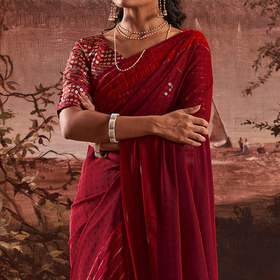 Dark Maroon Woven Georgette Saree With Tassels