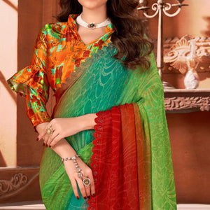 green-printed-moss-georgette-saree-with-swarovski-work-border