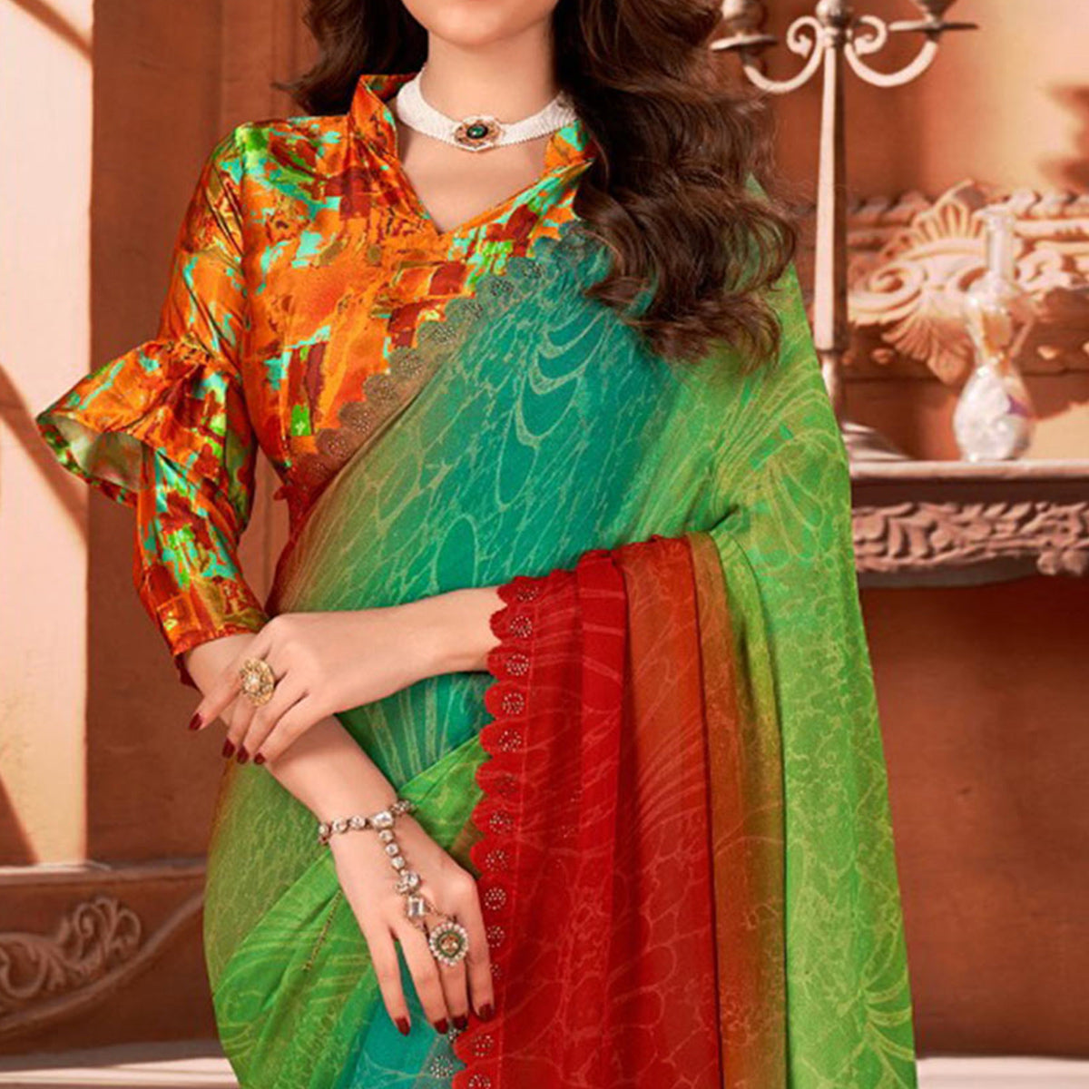 green-printed-moss-georgette-saree-with-swarovski-work-border