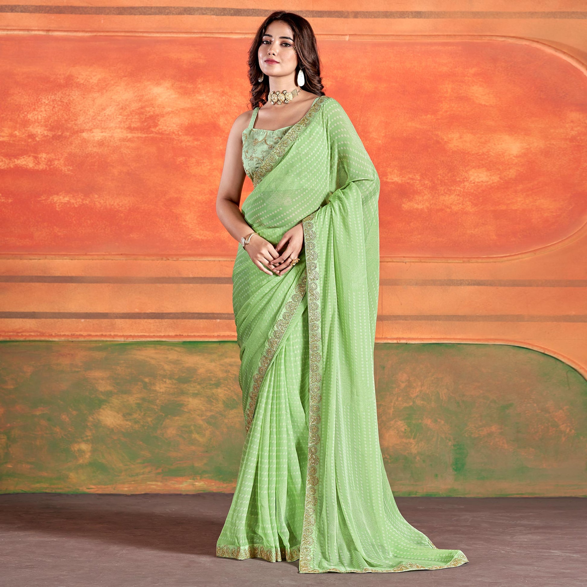 green-bandhani-printed-chiffon-saree-with-embroidered-border