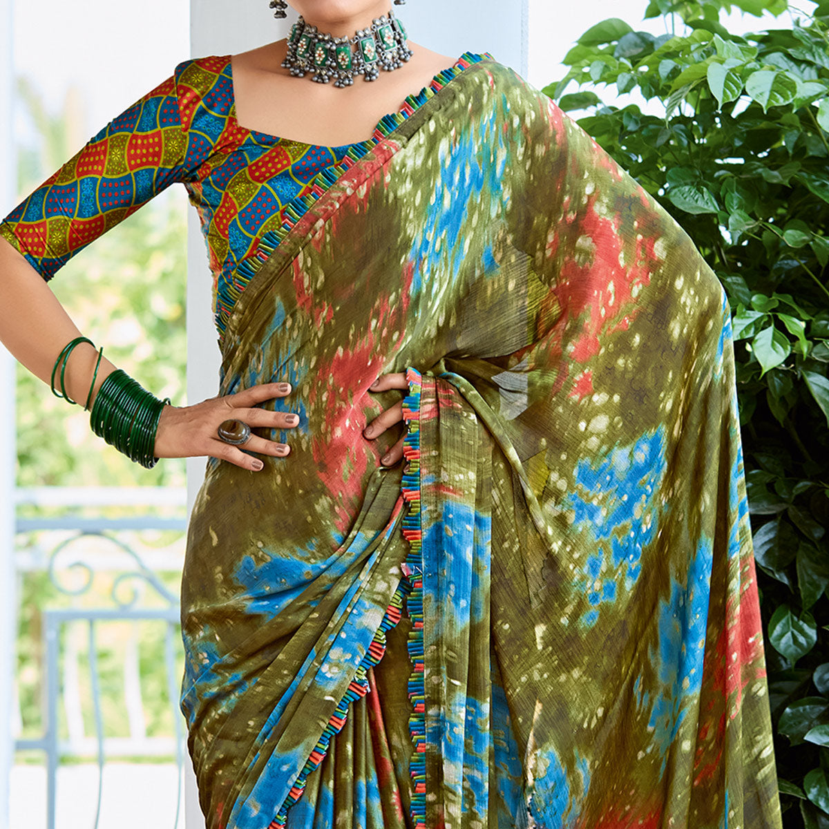 green-printed-satin-saree-with-frill-border