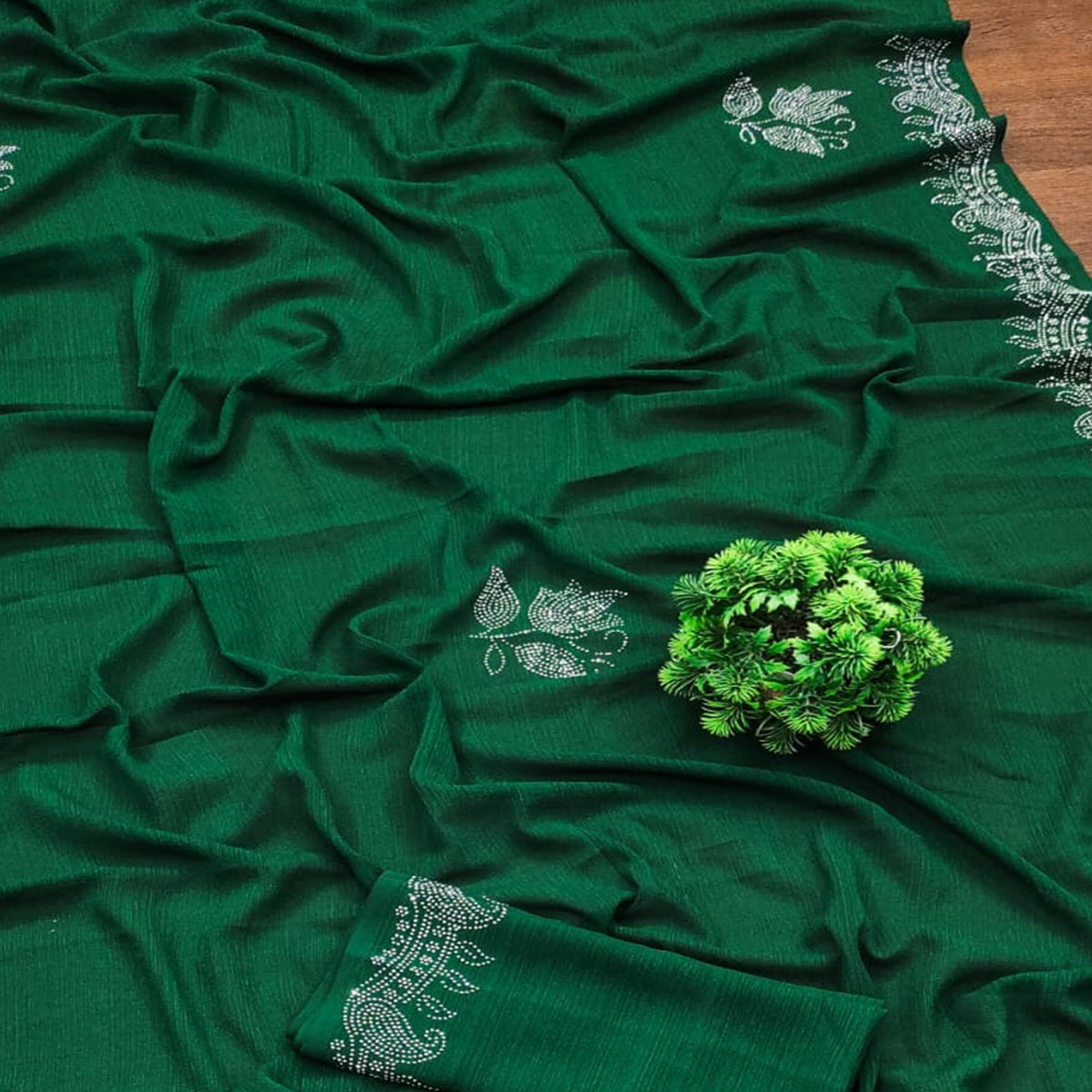 green-floral-swarovski-work-georegette-saree-with-tassels