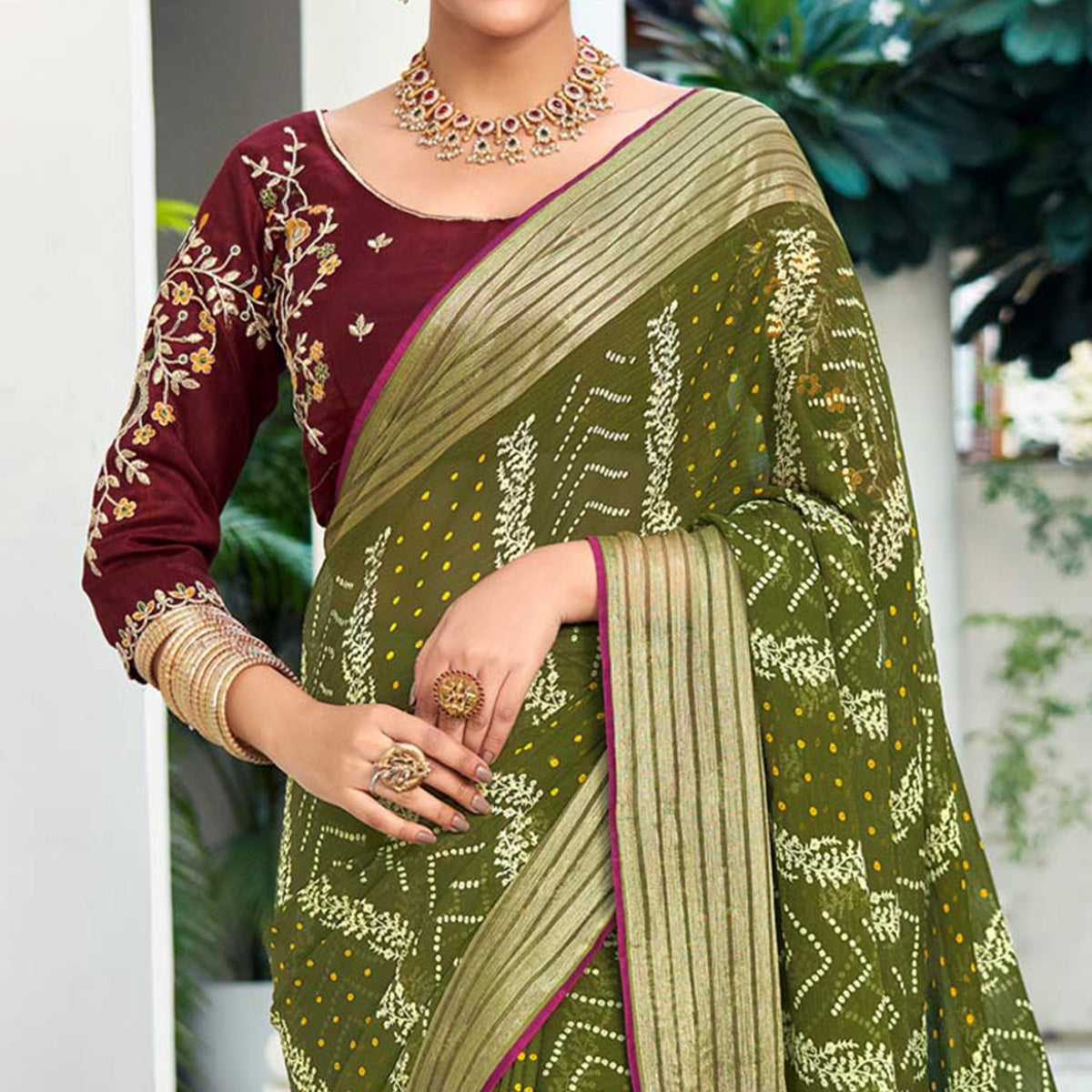 green-bandhani-printed-chiffon-saree-with-tassels