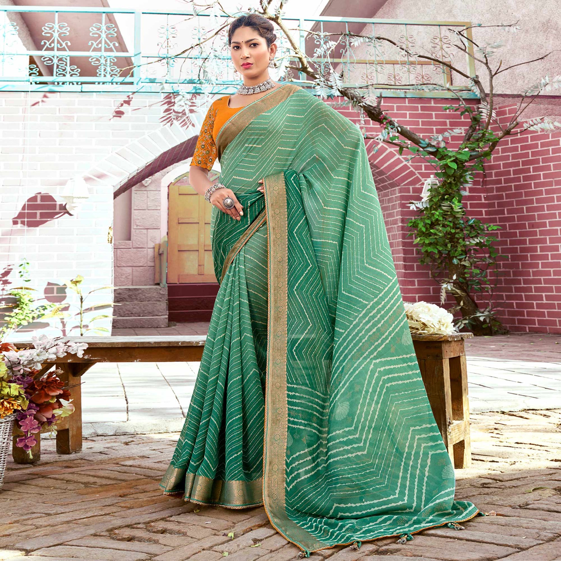 green-leheriya-printed-georgette-saree-with-jacquard-border