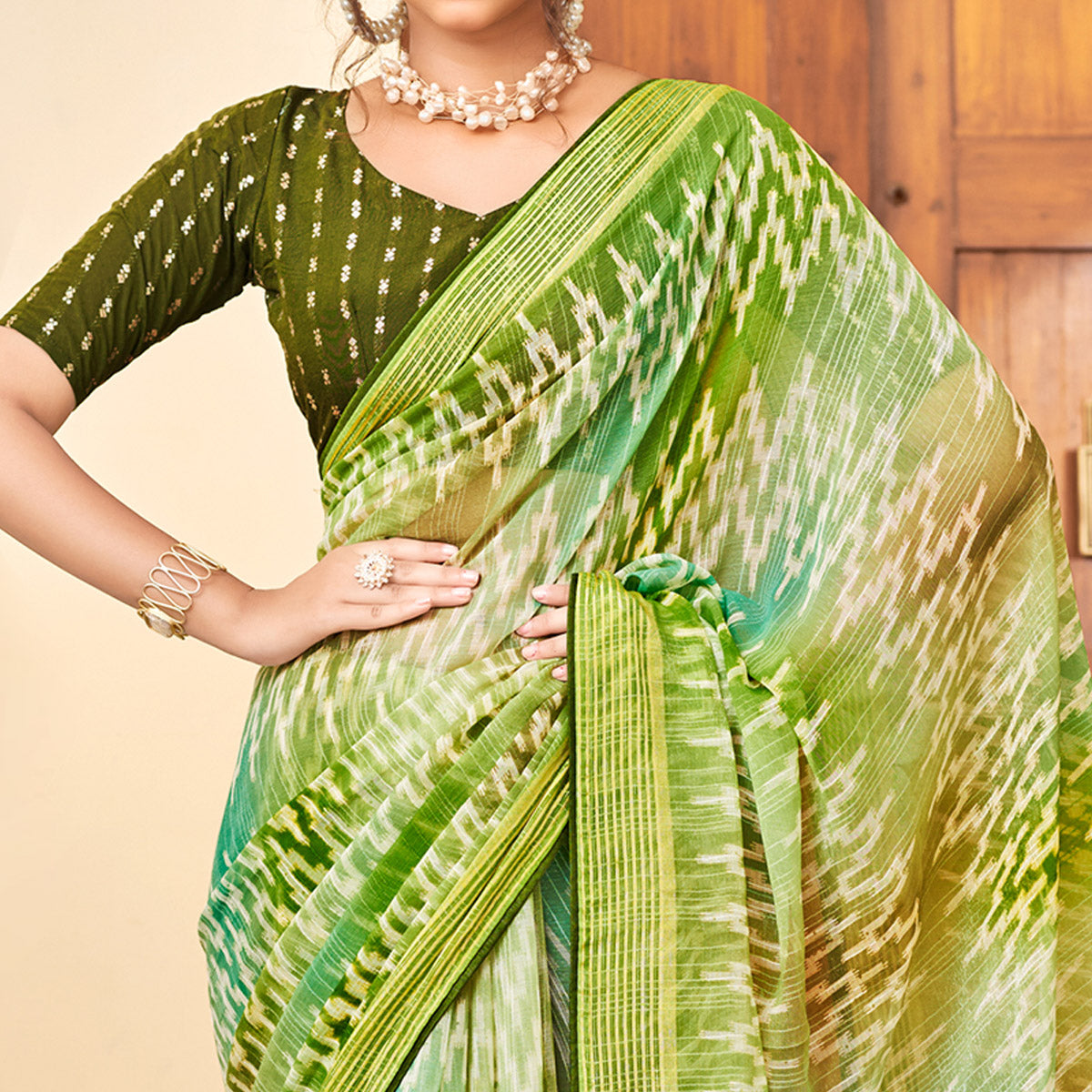 green-ikkat-printed-chiffon-saree