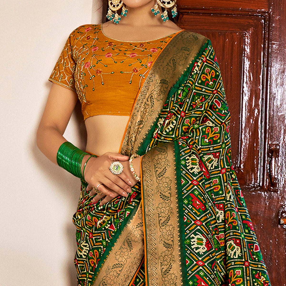 green-patola-printed-art-silk-saree-2