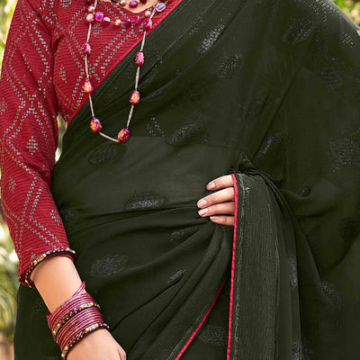 Bottle Green Woven Georgette Saree With Tassels