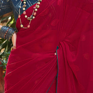Cherry Red Woven Georgette Saree With Tassels