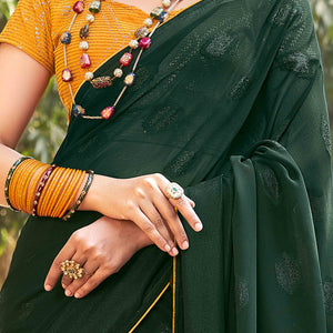 green-woven-georgette-saree-with-tassels-6