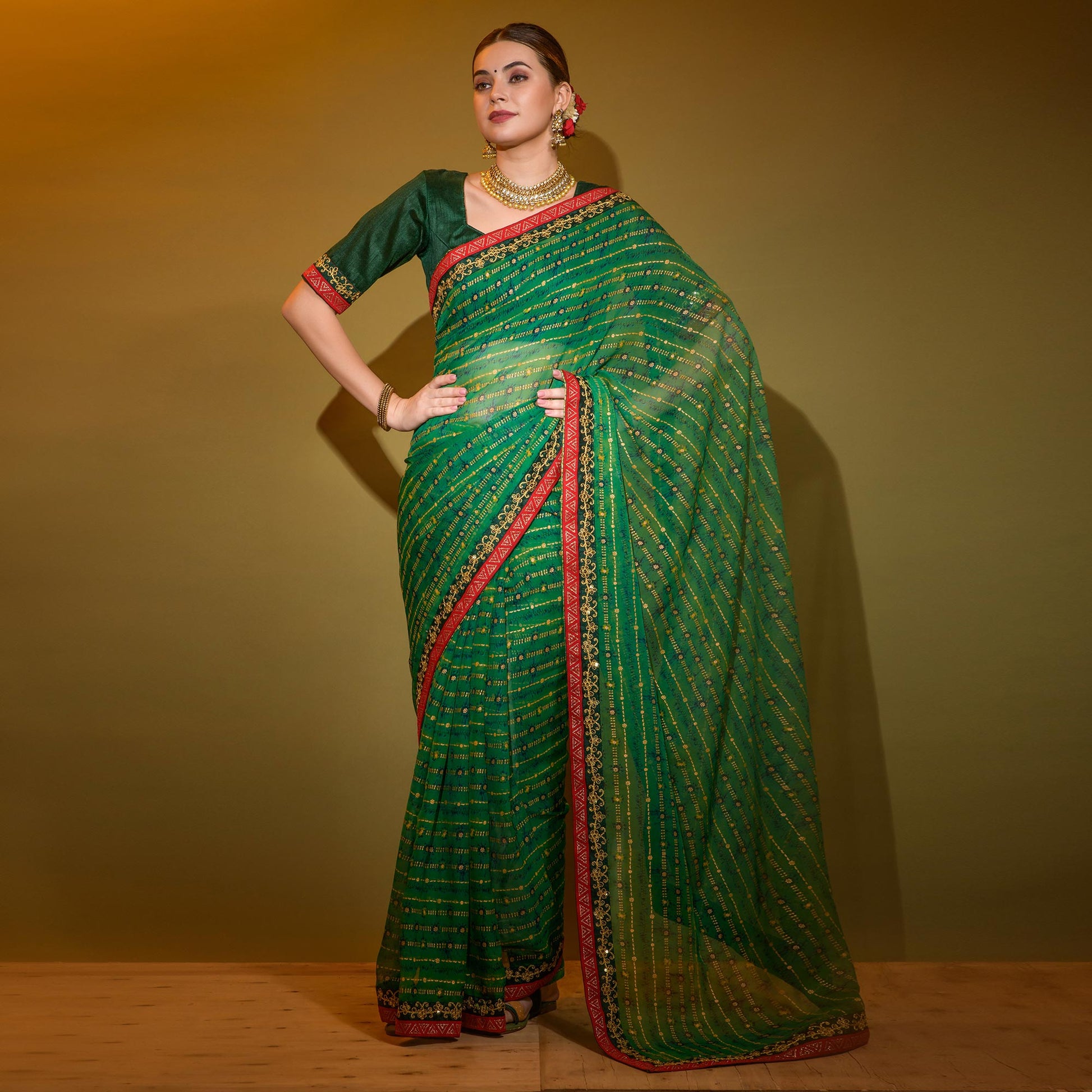 green-foil-printed-georgette-saree-with-embroidered-border