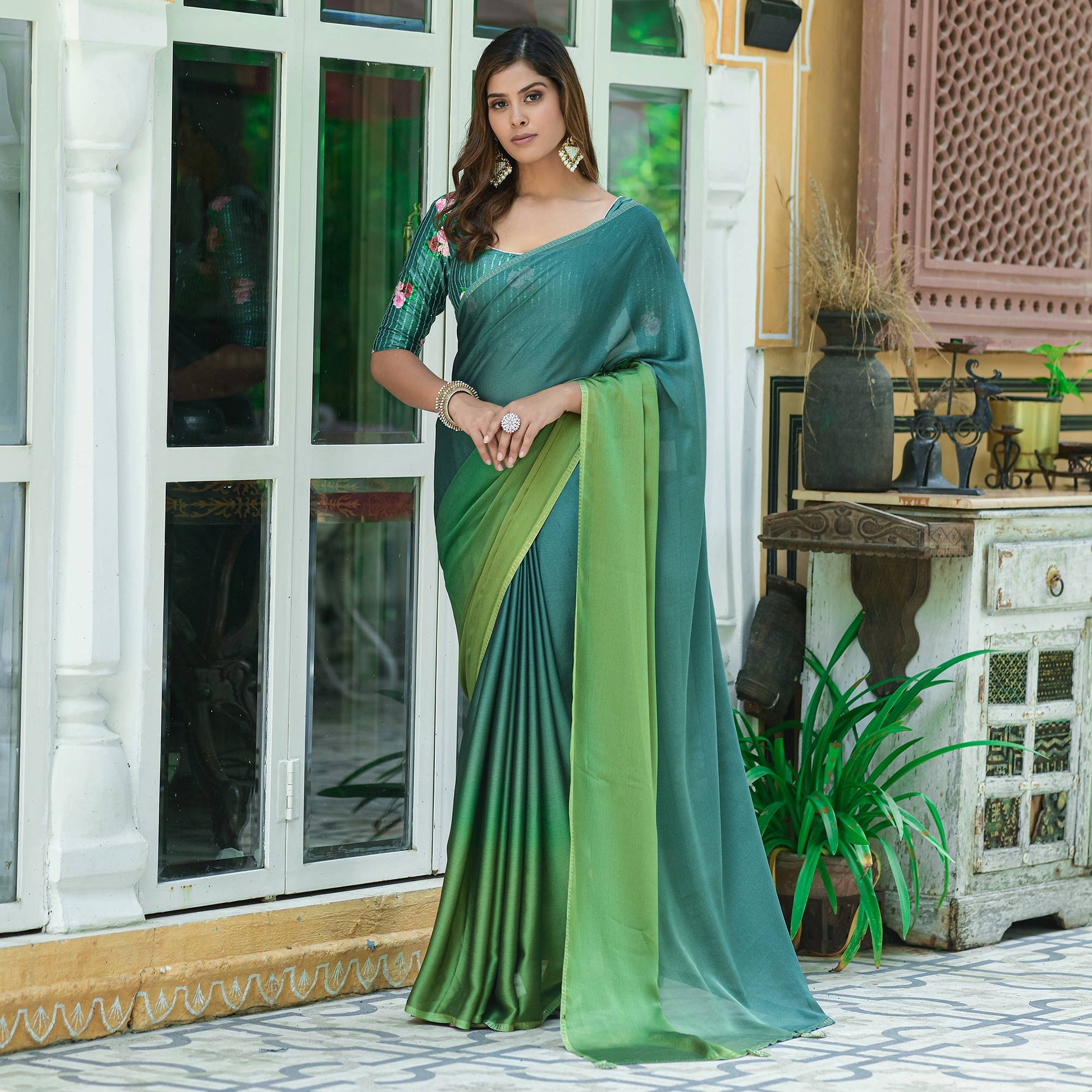 green-solid-chiffon-saree-with-tassels