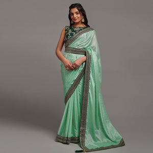 green-foil-printed-with-embroidered-border-chinon-saree-1