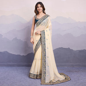 Cream Floral Sequins Embroidered Organza Saree With Lace Border