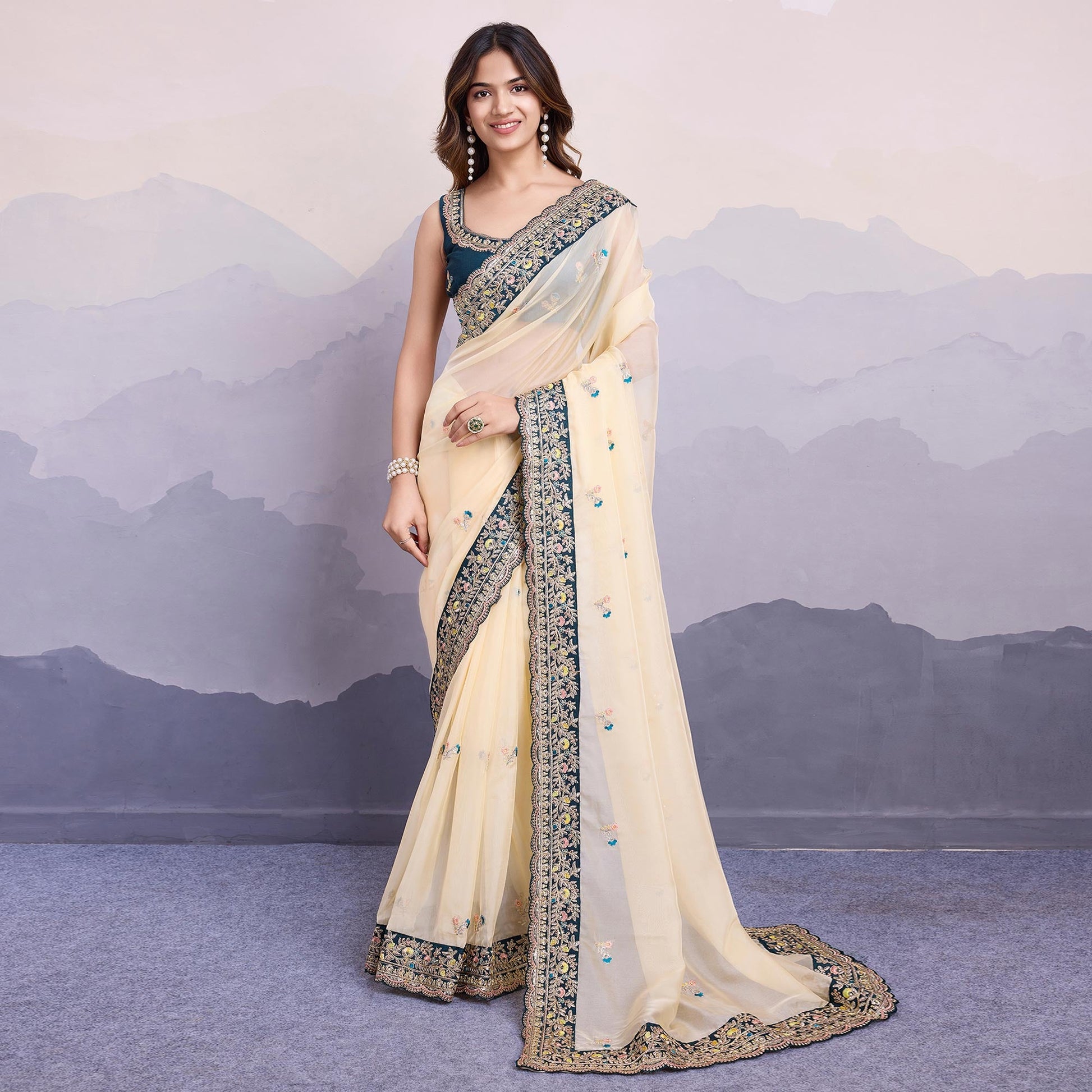Cream Floral Sequins Embroidered Organza Saree With Lace Border
