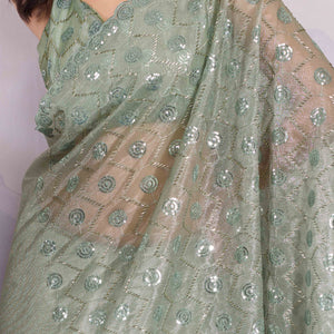 green-sequins-embroidered-twill-net-saree