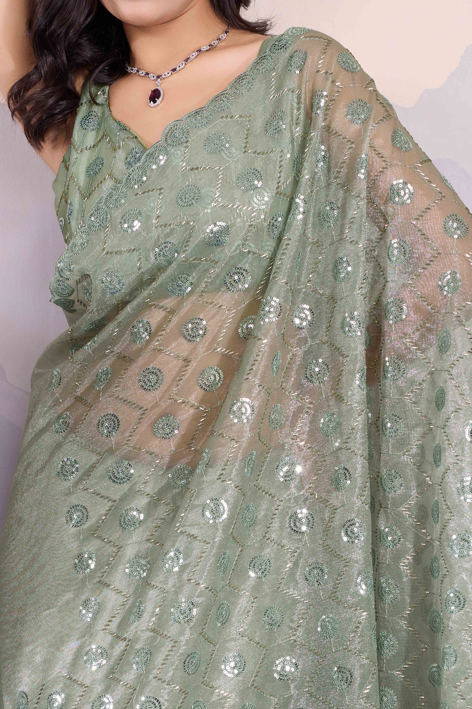 green-sequins-embroidered-twill-net-saree