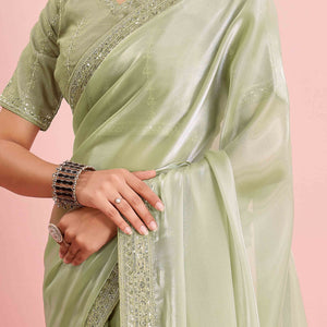 green-solid-with-floral-sequins-embroidered-jimmy-choo-tissue-saree