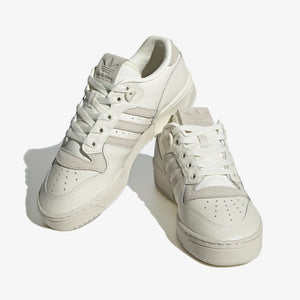Adidas Originals | RIVALRY LOW  { OFF WHITE/ALUMINIUM