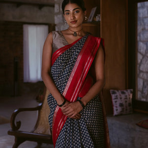Indo Chanderi Cotton Saree with Screen-printed Floral Motifs in a striking red border
