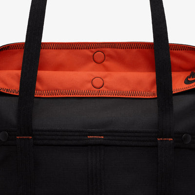 NIKE | SPORTSWEAR CARGO TOTE (12L) { BLACK/BLACK/ORANGE