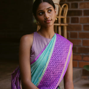 Turquoise Handloom Chirala Silk Cotton Saree With Handknotted traditional motifs above the border