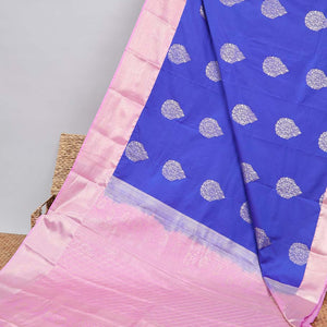 Blue floral motifs gift saree with contrast paisley border & intricate zari design pallu