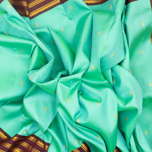 Turquoise Handloom Kanchipuram Korvai Silk Saree With Buttas