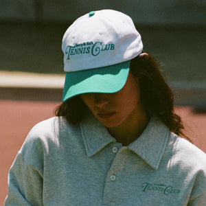 SPORTY & RICH | RIZZOLI TENNIS HAT { WHITE/CARIBBEAN
