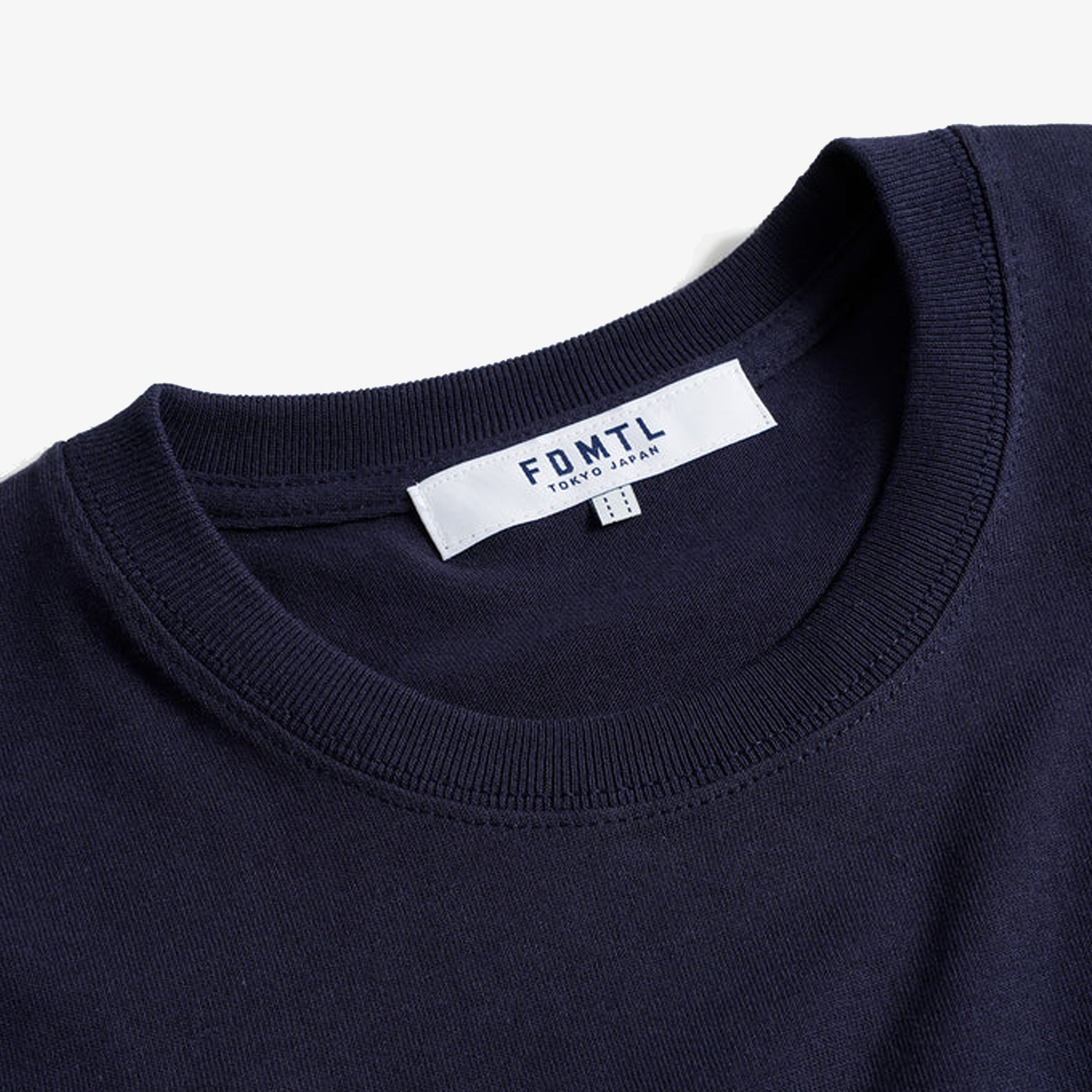 FDMTL | CIRCLE PATCH TEE { NAVY