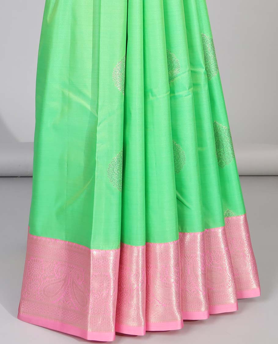 Green floral motifs gift saree with contrast paisley border & intricate zari design pallu