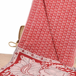 Red batik machine-printed kalamkari cotton saree, self-border & pallu of peacock motifs