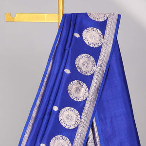 Blue floral buttas raw mango silk saree with self round buttas border & striped zari design pallu