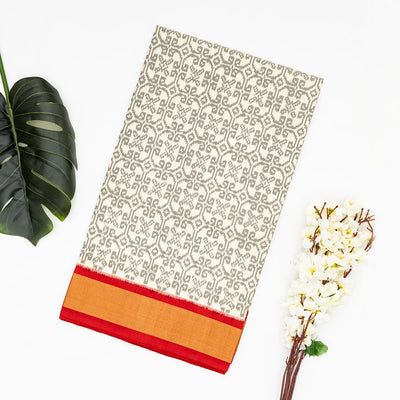 White Handloom Ikat Silk Saree With Contrast Red Border