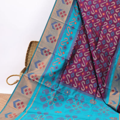 Purple floral design semi-pattola silk saree with contrast floral border &  floral, paisley design pallu