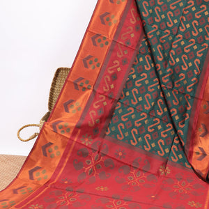 Green floral design semi-pattola silk saree with contrast floral border &  floral, paisley design pallu