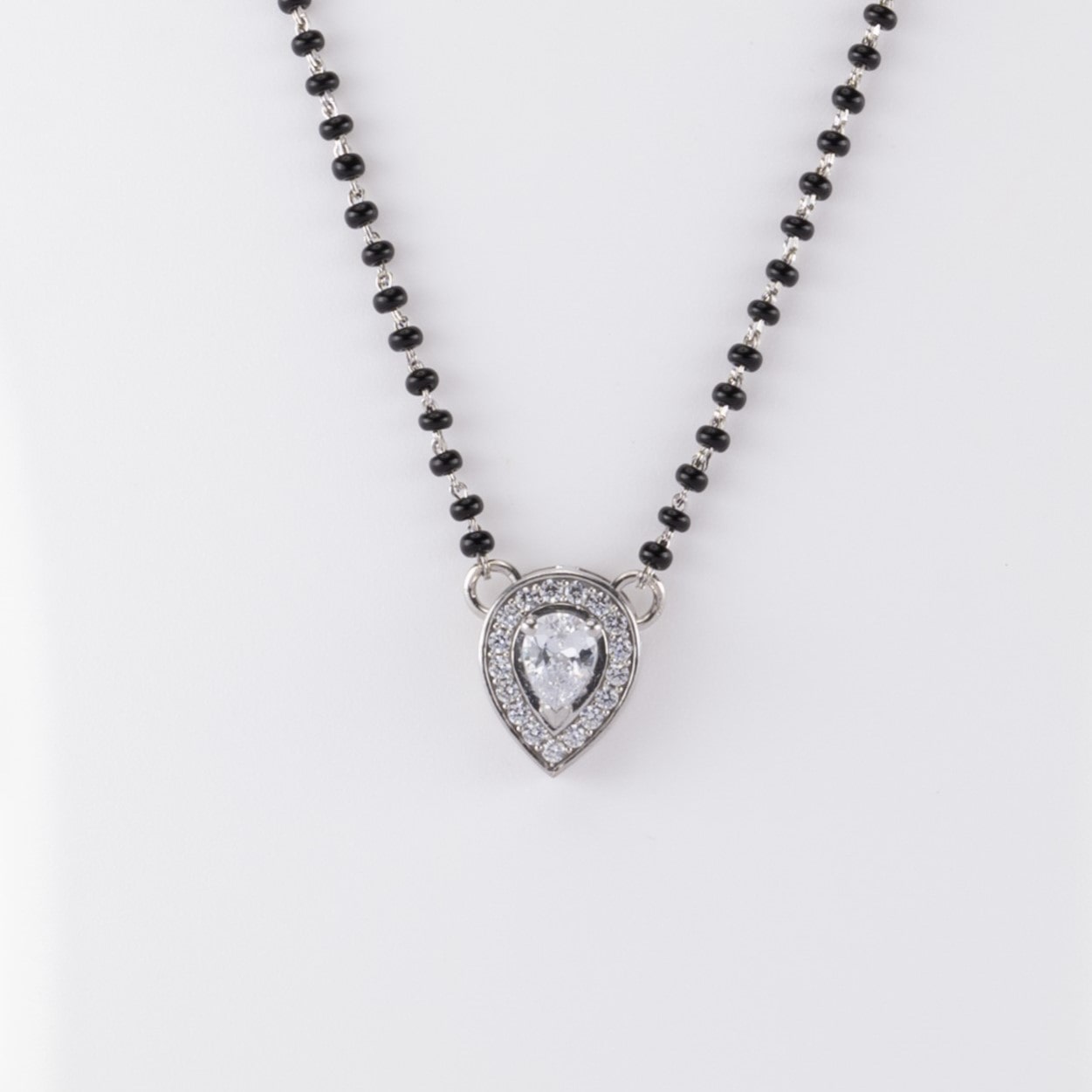 SOLITAIRE CONE SHAPE MANGALSUTRA IN SILVER 92.5