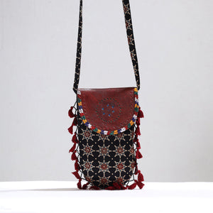 Black - Kutch Leather & Mashru Silk Sling Bag with Tassels 24