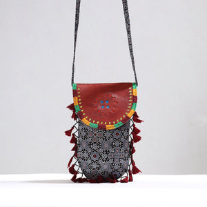 Black - Kutch Leather & Mashru Silk Sling Bag with Tassels 31